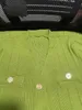 Primavera moda francese verde lavorato a maglia abito di media lunghezza donna scollo a V bottone B monopetto volant maglione sottile partito 240318