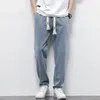 Męskie dżinsy wiosna jesienna bawełna miękkie sznurka proste spodnie elastyczne talia vintage korea