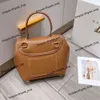 Mode kvinnors handväska polen väska fransk avancerad äkta läder clamshell vintage handhållen en axelväska handhållen ny lyx mångsidig polens tygväska