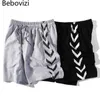 Shorts voor heren Bebovizi hiphop straatkleding shorts geometrische joggingshorts 2021 heren katoenen casual joggingbroek zomer trainingsshorts J240322