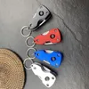 Mini herramienta de mano portátil EDC llavero al aire libre llavero herramientas con cuchillo de supervivencia flexo multifunción linterna LED antorcha tripulante abridor de botellas