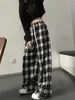 Pantalon femme noir et blanc à carreaux femmes décontracté lâche pantalon large ins rétro adolescent droit hiphop streetwear
