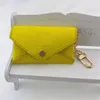 Luxo designer chaveiro moda feminina mini bolsa de couro de alta qualidade saco de mudança de bolsa colorida