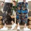 Verão masculino casual capris lanterna calças perna larga praia floral solto grande estilo chinês