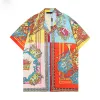 Hommes Designer Survêtements Mode d'été Hawaii Floral Print Chemise décontractée Hommes Femmes Casual Short de plage à manches courtes Costume deux pièces