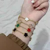 Bracelets de charme 2023 INS vente chaude 10 couleurs cinq feuilles fleur classique mode réglable douce romantique femme fête bijoux L240322