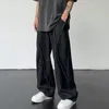 Jeans da uomo Pantaloni hip-hop effetto consumato Pantaloni larghi in denim patchwork strappati casual a gamba larga vestibilità dritta