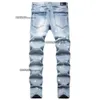 Ny 2023 Spring Trendy Light Color Perforated Jeans med vikta smala fit elastiska fötter Mäns byxor