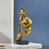 Thinker heykeli heykel sessizliği altın figürinler reçine reçine retro ev dekoru ofis çalışması için oturma odası soyut yüz süslemeleri 240314
