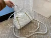 Bolso de hombro a la moda de diseñador de lujo, bolso tipo cubo de alta calidad, cartera cruzada con flores para mujer, bolso con cordón para mujer