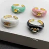 Anillos Anillos Nuevo anillo de diseñador de moda Anillos de esmalte multicolor de plata de oro de 18 quilates para la moda Para hombre Compromiso de amante de mujer Anillo de pareja ajustable de alta calidad