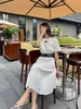 Women's Two Piece Dress Set High Quality Spring New Round Neck Short Top High Waist Pleated Mid length Skirt Fashion Commuting Versatile Set for Women