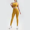 Nagie spodnie do jogi Zestaw Europejskiej i Amerykańskiej Odzież Brzoskwiniowa, aby podnieść kolory fitness Kombinet Bra 240307