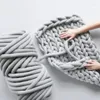 毛布1kg/pcの厚さのかさばる糸手編みのかぎ針編みのための柔らかいビッグコットンディーアームロービングスピンブランケットウールの装飾