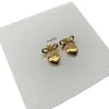 Women Gold Stud Earring Designer smycken varumärke hjärtstuds för kvinnors bokstav c sier hängande örhängen hoops mode premium box