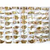 Pierścienie zespołowe 100pcs/Lot Laser Cuting for Women Style Mix Gold Stalom Steel Charm Pierście