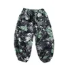 Verão masculino casual capris lanterna calças perna larga praia floral solto grande estilo chinês