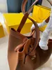 디자이너 핸드백 여성 접이식 가방 버킷 토트 백은 스타일로 열리면 모양을 바꿀 수 있습니다.
