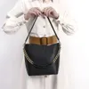 Designer de moda bolsa grande capacidade balde de deslocamento para mulheres na primavera nova alta qualidade e moda versátil corrente ombro único crossbody a1