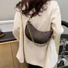 Crossbody Bag Tasarımcı En çok satan marka kadınlar Bahar Yeni Hilal Çantası Eski Çiçek Under Emfer Emner Zincir Tek Omuz Çok yönlü banliyö