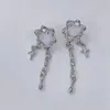 Boucles d'oreilles pendantes Love Starlight, pompon asymétrique pour filles, croix douce, chaîne en métal Zircon pour femmes, bijoux