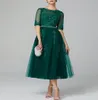 Robe de cocktail illusion de tulle sans bretelles Jewel Aline vert foncé, manches mi-longues avec appliques et perles6209001