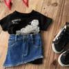 Moda bambini nero lettera stampata T-shirt INS bambini buco manica corta Tees 2024 bambini estivi Bordi irregolari denim Cintura S1259