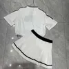 ツーピースドレスデザイナー2024夏の新しいカジュアルレイジースタイルコントラストポロネック短袖とプリーツスカートガールスタイルセットhfww