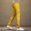 2023 Summer New Men's Splicing Perforated Fluorescent Yellow Casual Slim Fit Trend Small Feet Mid Waist Pants for Men