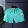 Mäns shorts 2024 modesimbyxor Mens Simning Shorts Snabbtorkande strandbyxor Simdräkt Andningsbar fickuppsättning J240322