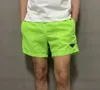 Homem designer homens shorts calças de praia shorts verão nadar curto na altura do joelho hip hop high street treinamento esportivo calças de praia homens mulheres algodão casal cintura elástica