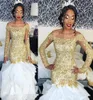 2020 New African Black Girl Mermaid Wedding Dresses Off Shoulder Gold Lace Appliques Beaded Long Sleeves Tiered Ruffles Organza Br6122138