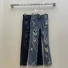 Jeans femininos de primavera/verão de primavera/verão com cintura alta para a tendência da moda de emagrecimento 240319