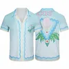 Chemise Casablanc Homme 2024 camisas de diseñador camisa con botones estampado para hombre camisa casual para mujer camisa suelta de manga corta de seda