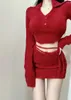 Robes de travail de Noël rouge tricoté deux pièces ensemble femmes coréenne mode fête pull jupe costume femme chaud bandage sexy mince mini
