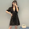 Basic & Casual Dresses designer brand Miu Miao Black Short sleeved Dress with Wooden Ear Edge Printed V-neck for Slim Appearance in Chiffon Skirt Summer New 09U0