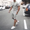 Tute da uomo Set da corsa Abbigliamento sportivo estivo Tute da palestra Tute da fitness T-shirt ad asciugatura rapida Abbigliamento sportivo corto Allenamento da allenamento Tuta sportiva