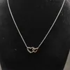 Necklaces Classic Twisted Charming Hollow Designers Jewelry Double Love Necklace Fashionable Personality Versatile Metal Luxury Pendant