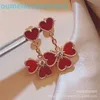2024 Jewelry Designer Brand Vanl Cleefl Arpelsstud Earrings Four Leaf Grass for Womens Shaped Love 18k Rose Gold Heart Tassel Earrings