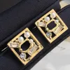 Euro-amerikansk stildesigner örhängen diamantbrev Pearl Eartrop varumärke rostfritt stål sier kristall örhänge män kvinnor bröllop smycken födelsedag present