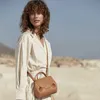 Designer bolsa de ombro frete grátis nicho francês dign um crossbody bolsa das mulheres couro genuíno viajando smiley rosto portátil pequeno