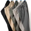 Menowe proste spodnie Spodnie swobodne Monochromatyczne rozmiary plus M6xl elastyczna talia 100% bawełniana dziewiąta 2024 240313