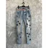 Designer Mens Jeans with Holes Loose Fitting Slimming Splashed Ink Casual Denim Pants Hip-hop Handmade Nail Drill