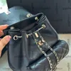 Luxury Designer Black Duma Classic Mini Flap Drawstring Bucket Backpack Bags Lambskin Gold Metal Hardware Matelasse Chain Shoulder Handbags Large Purse 24.5X22CM