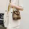 Bolso de hombro de diseñador, marca más vendida, bolso de cubo a la moda, novedad de verano, estilo versátil, cruzado para mujer