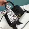 Bolsos de diseñador de moda Pequeños Mini bolsos de reloj de arena Bolsos de mujer Monederos de compras Cartera de cuero de PU de lujo con logo de letra B