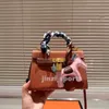 10A مصمم Tote Women Totes Handbags Luxurys مقبض محفظة حقيبة Crossbody Crossbody الأجهزة الذهبية عالية السعة مع الحروف 20 سم