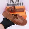 Mode tofflor kvinnor designer sandaler för kvinnors tofflor mens casual loafers skor utomhus strandskivor platt botten med spänne unisex äkta läder g601f