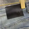 Högkvalitativa män jeans designer byxor män smal liten rak bomull casual denim byxor modea triangel logotyp brev grafiska denims byxor