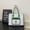 2024 Nouveau Starbucks Designer Mode Voyage en plein air Sac fourre-tout Sacs à bandoulière Sports Fitness Yoga Grande capacité Sac de rangement en toile verte blanche pour femmes